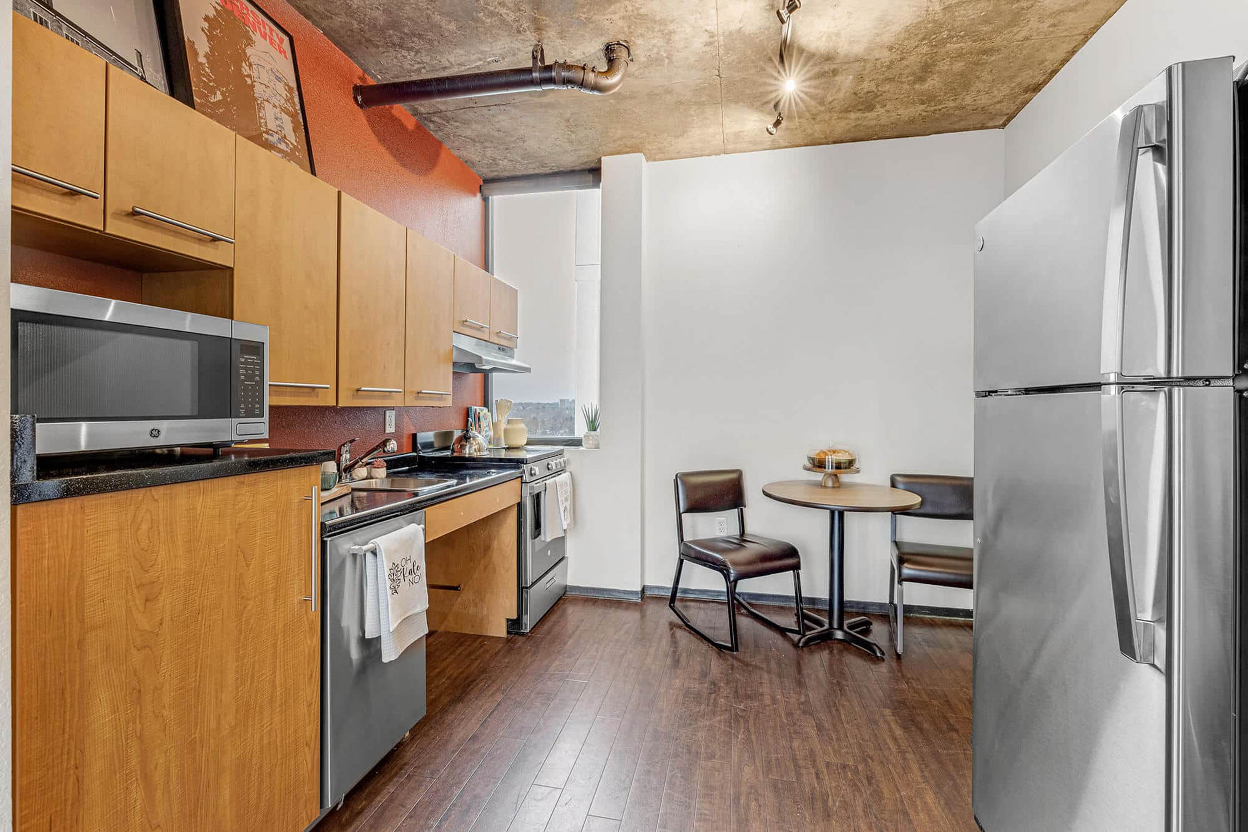 Chic industrial kitchen with wood and stainless steel