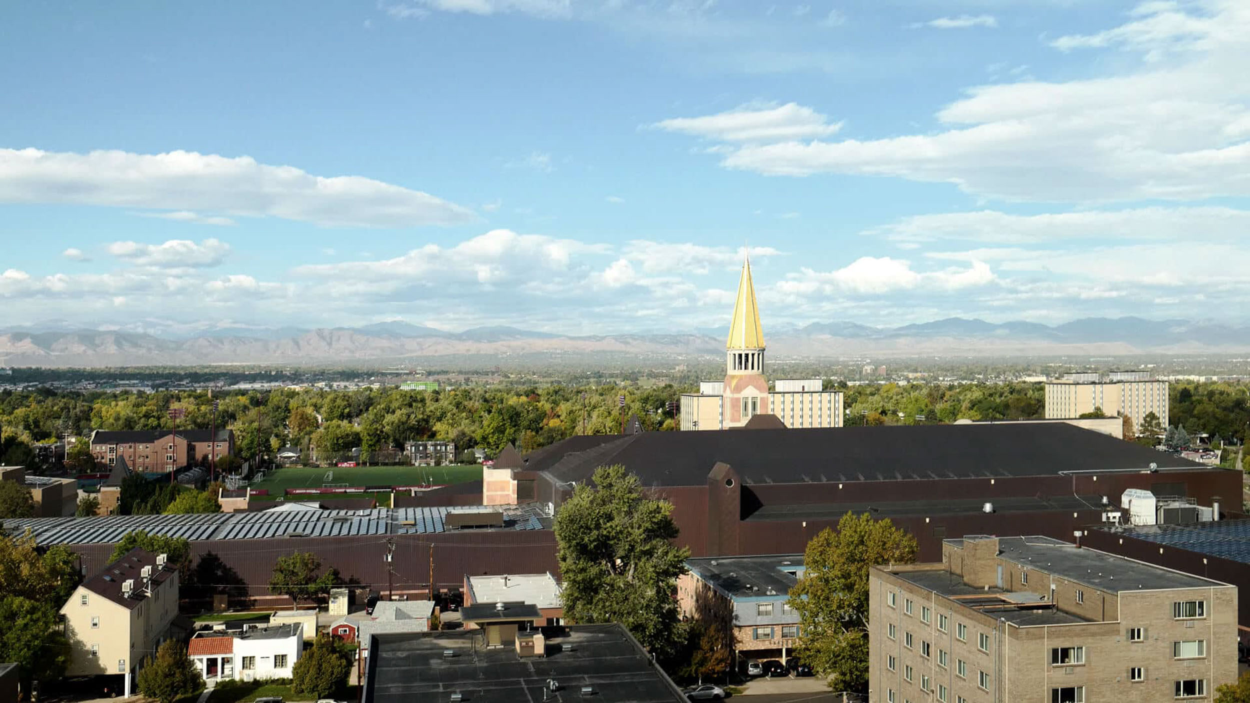 View of the city and mountains from Vista Denver apartments